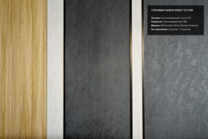 Отделка стен панелями под дерево и бетон ламинированными ПВХ пленкой со скрытым креплением в номерах отеля Москино