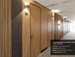 Отделка стен реечными панелями под дерево и бетон ламинированными ПВХ пленкой со скрытым креплением в номерах отеля Москино